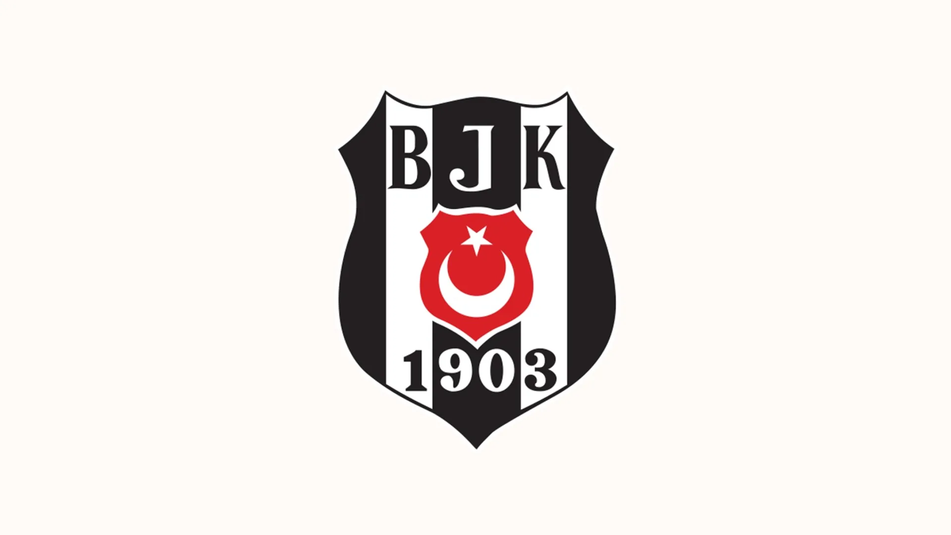 Siyah beyaz çizgili BJK 1903 yazılı kulüp arması, ortasında ay yıldız