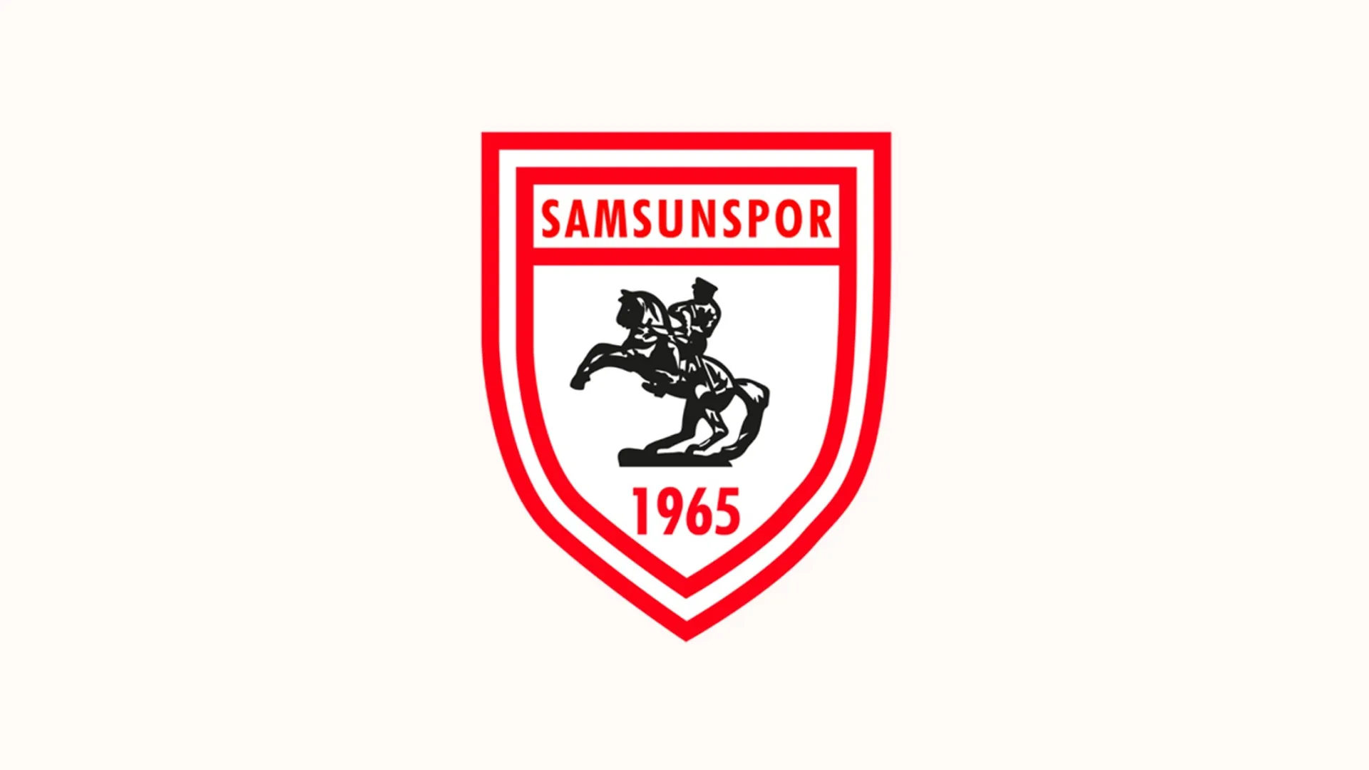 Beyaz zemin üzerinde kırmızı çerçeveli, atlı heykel figürlü ve 1965 yazılı Samsunspor arması