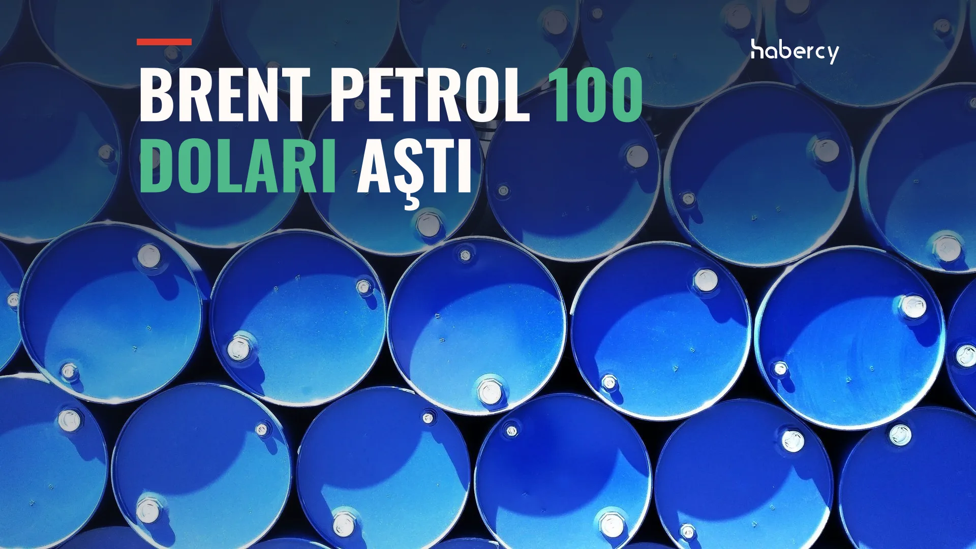 Siyah zemin üzerinde kırmızı büyük rakamlarla 100,49 dolar yazan Brent petrol fiyat grafiği